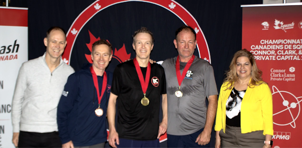 Joey Forster (second from right, grey shirt) with silver medal at 2025 Canadian Senior Championships - Men's 50+ Division