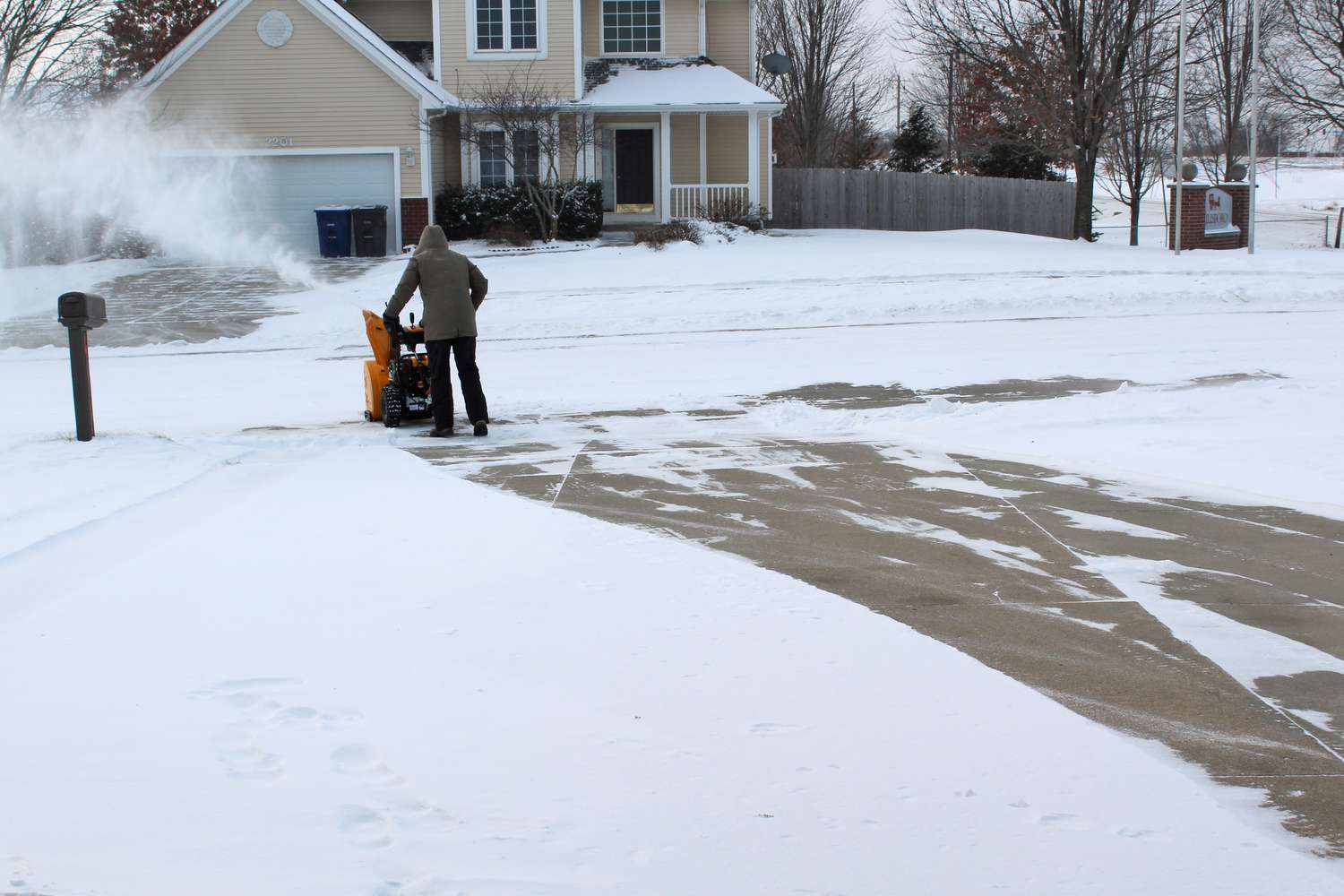 Snow blowing driveway